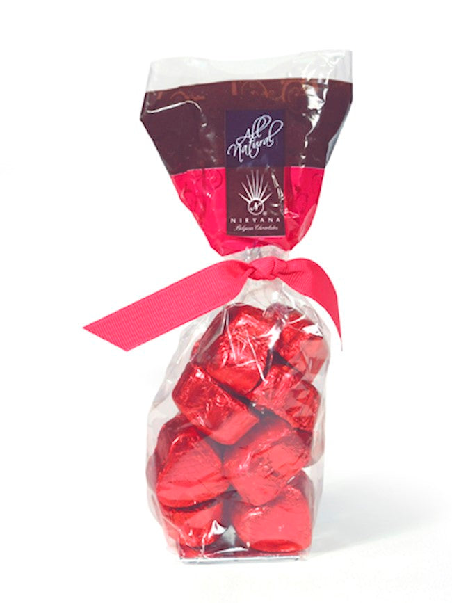 Wholesale Nirvana 10 Pc. Red Foil-Wrapped Milk Chocolate Hearts W/Caramel & Sea Salt Filling In Cello Bag 5.29 Oz.-12 Ct Case Bulk