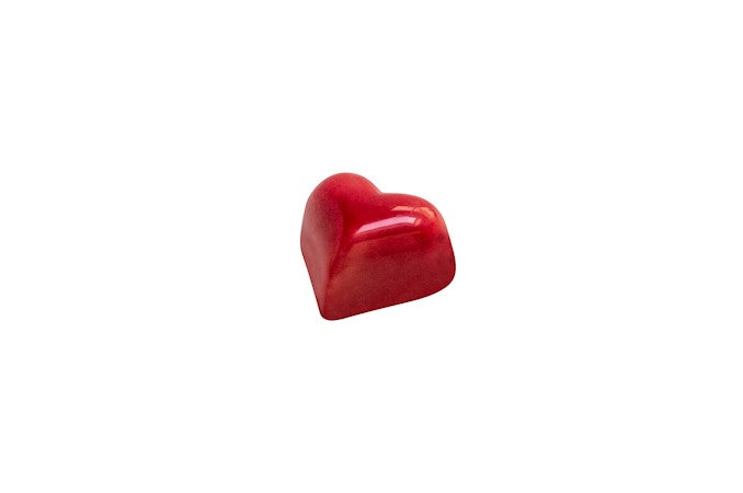 Wholesale Nirvana Bulk case of red-colored hearts in white chocolate with crunchy praline filling (approx. 60) 0.59 OZ- Bulk