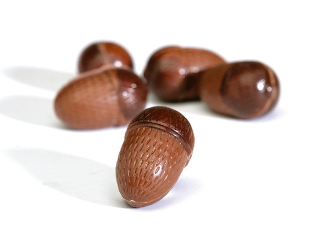 Wholesale Nirvana Bulk Case Of Acorn Shaped Milk Chocolates W/Praline Filling-65 Ct Case Bulk